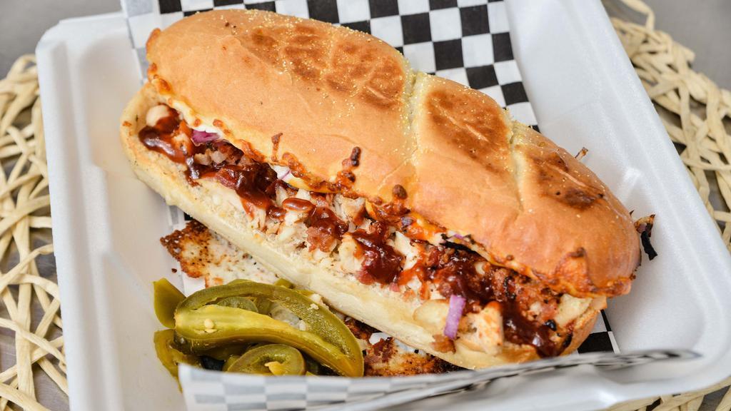 Backyard Chicken Bbq · Grilled white chicken, bacon, red onion, cheddar and mozzarella cheese, smothered in BBQ sauce. Add jalapenos to make it spicy.
