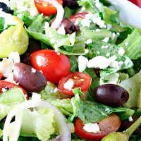 Greek · Romaine lettuce, red cabbage, cucumbers, red onions, black olives, tomatoes, feta cheese, pe...