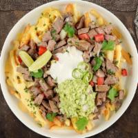 Miss Caliente Asada Fries · (Vegetarian) Sour cream, melted cheese, guacamole, cilantro, grilled onions, grilled jalapen...