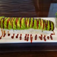Caterpillar Roll · Inside crab meat, cucumber, and eel top with avocado, eel sauce, and tobiko.