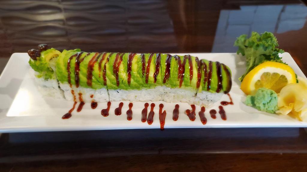 Caterpillar Roll · Inside crab meat, cucumber, and eel top with avocado, eel sauce, and tobiko.