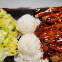 Teriyaki Chicken · Grilled boneless chicken marinated in sauce. Served with steamed rice and salad.