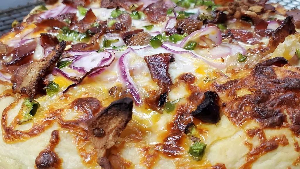  Chefs Choice · Garlic Oil, house red sauce, Sun Dried Tomatoes, Bacon, Garlic Confit, Jalapeños, Red Onions, Cotija, Mozzarella & Cheddar Jack Cheese                              MMMMMMMMunchtastic!