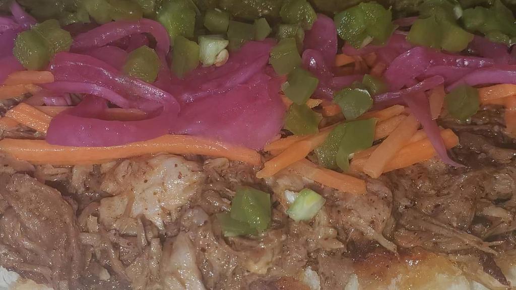 Bahn Mi  · Slow braised pork carnitas, pickled carrots & onions, fresh jalapenos, sriracha mayo and salsa verde on a toasty roll!