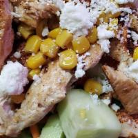 Grilled Southwest Chicken Salad · House salad blend, fresh grilled blackened chicken, red onion, tomatoes, chili cotija cheese...