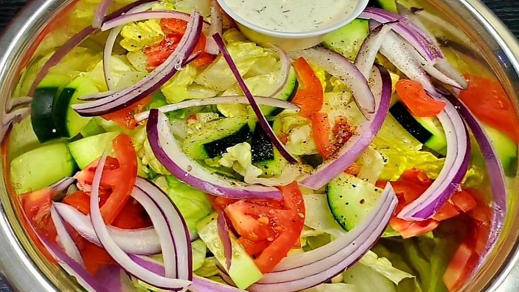 Side Salad  · Choice of A Caesar or House salad with cucumber, tomato, carrots and red onion, with ranch,  house herb or citrus  vinaigrette.