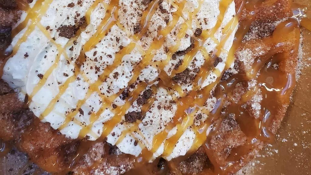 Mexican Hot Chocolate Waffle · A fresh hot Belgian waffle deep fried then dusted in cinnamon sugar topped with Mexican Chocolate, whipped cream and caramel sauce...
