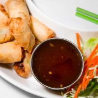 Spring Rolls · Chopped vegetables rolled in wheat wrapper and deep fried, served with plum sauce.