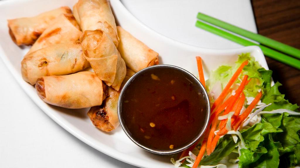 Spring Rolls · Chopped vegetables rolled in wheat wrapper and deep fried, served with plum sauce.