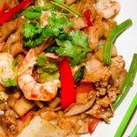 Phud Kee Mao (Drunken Noodles) · Wide rice noodles stir-fried with chili paste, egg and mixed vegetables and choice of meat o...