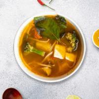 Yummy Tom Yum Soup · Mushrooms, tofu, tomato, onion, carrot, and exotic herbs, in hot and sour lemongrass broth.