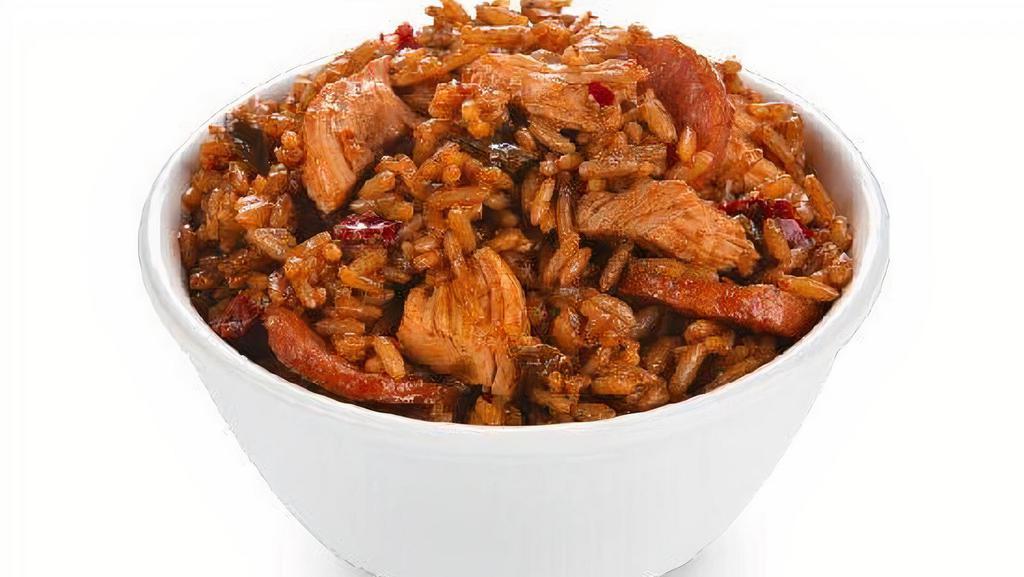 Jambalaya - Large · Rice with sausage, Krispy Krunchy chicken pieces, along with celery, onion, and green pepper flavors will warm you up and brighten your day with just one bite