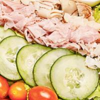 Chef Salad · Spring mix, sliced turkey and ham, hard-boiled egg, sliced cucumbers, cherry tomatoes, cup o...