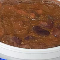 Chili · Tender beef simmered in a sweeter tomato sauce seasoned with chili and ground pepper, dark r...