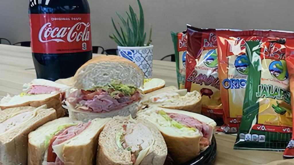 Office Hero Meal · Medium Sub Tray, 5 chips, 5 cookies, and a gallon tote of your favorite beverage with cups. Subs include mayo, mustard, lettuce, tomatoes and light house dressing. Feeds 5.