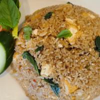 Tofu Basil Fried Rice (V) · Jasmine rice, yellow onion, basil leaves, stir fried in house sauce.