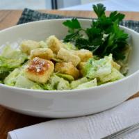 Side Caesar Salad · Romaine, croutons, caesar dressing, parmesan cheese.