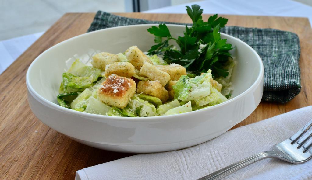 Side Caesar Salad · Romaine, croutons, caesar dressing, parmesan cheese.