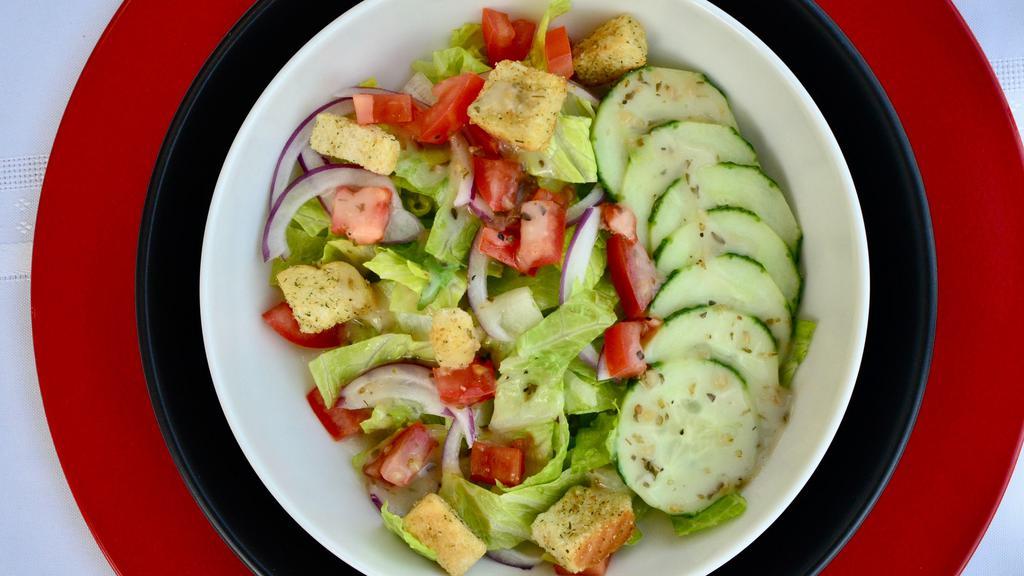 Entrée House Salad · Romaine, cucumber, red onion, Roma tomato, croutons, Italian dressing
