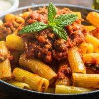 Rigatoni With Meat Sauce · Rigatoni pasta, Grandma's Sunday meat sauce made with ground beef, parmesan cheese.