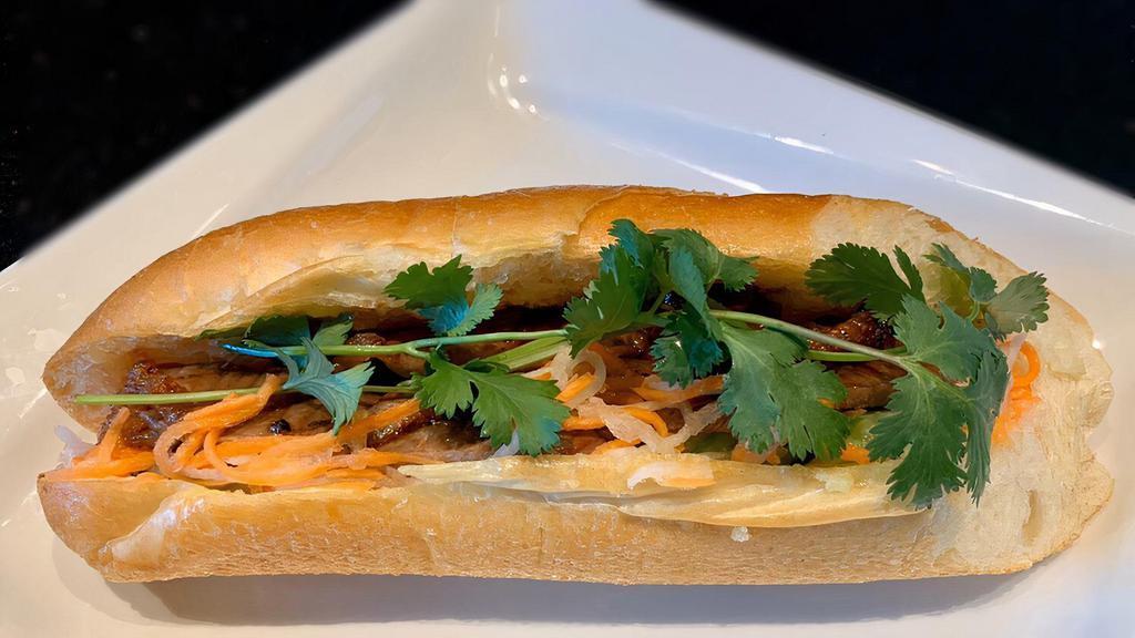 Vietnamese Sandwich (Pork/Chicken/Char Siu Meat/Tofu) · with egg mayonnaise, cucumbers, carrot and daikon pickled, cilantro, jalapeno, homemade sauce