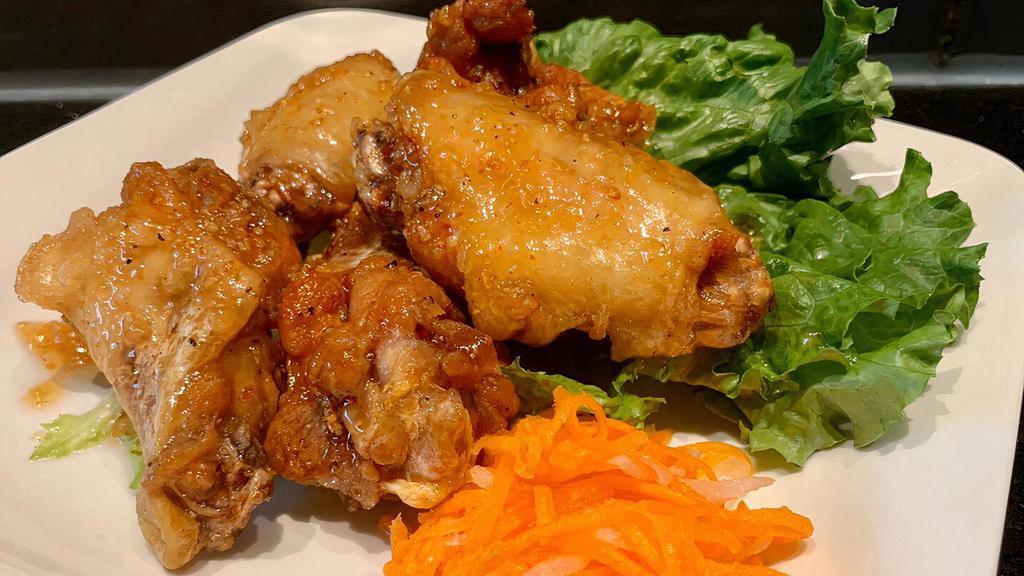 Caramelized Chicken Wings (5Pcs) · Crispy deep-fried chicken wings tossed in caramelized sweet chili fish sauce.