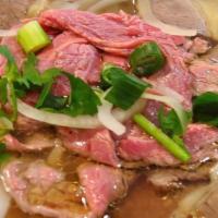 Beef Pho · Richly seasoned Vietnamese style beef broth ladled over rice noodles and thin slices of tend...