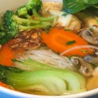 Vegetarian Pho · Vegetarian. Richly seasoned 100% vegetable stock ladled over rice noodles and fresh or fried...