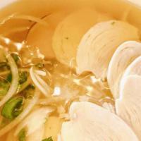 Chicken Pho · Savory Vietnamese style chicken broth ladled over rice noodles and sliced chicken breast, se...