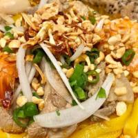 Da Nang Tumeric Noodle · Seasoned tumeric broth ladled over wide rice noodles, minced pork, shrimp & diced jicama top...