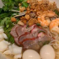Phnom Penh Noodle Soup · Shrimps, squids, quail eggs, BBQ pork and fried ground pork with rice noodles in rich aroma ...