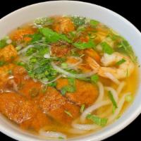 Danang Fish Cake Noodle Soup · broth made from pork bones and dried seafoods, served with thick noodle and fried fish cake