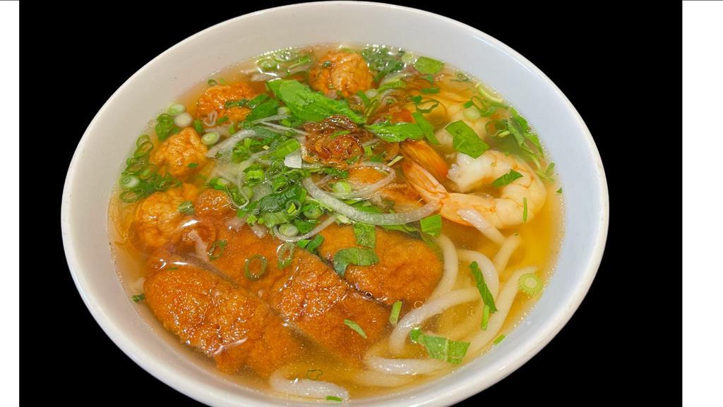 Danang Fish Cake Noodle Soup · broth made from pork bones and dried seafoods, served with thick noodle and fried fish cake