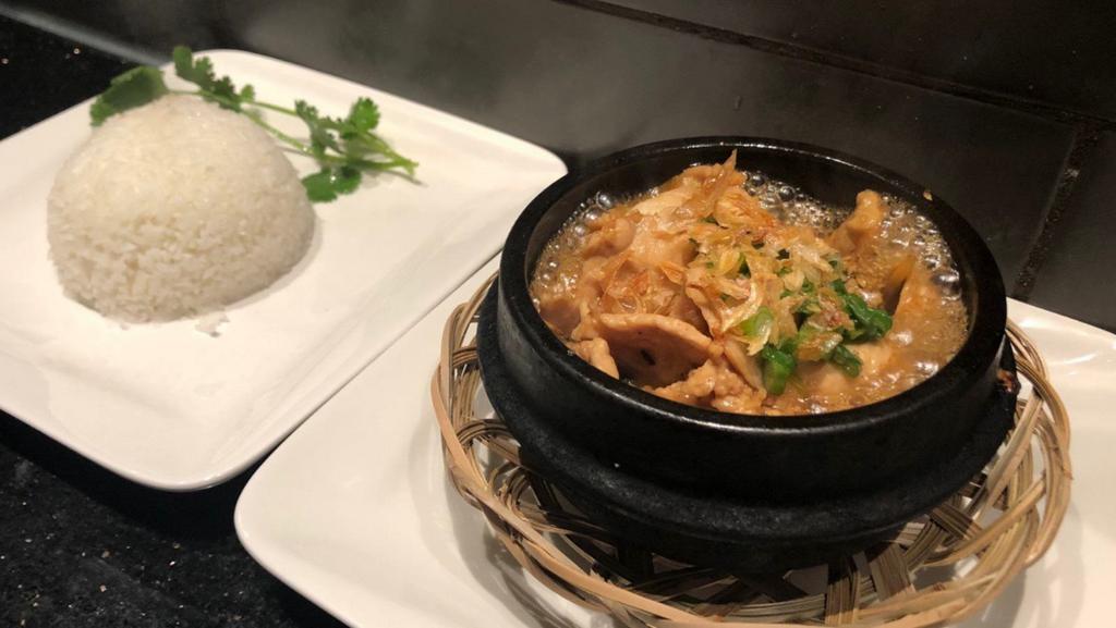 Ginger Chicken Clay Pot · Braised chicken in caramelized shallot soy sauce with fresh ginger, served with jasmine rice.