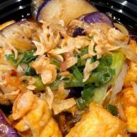 Eggplant Clay Pot · Asian eggplant braised in shallot soy sauce with onion, garlic and black pepper, crispy tofu...