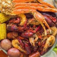 4 Combo · Snow crab legs, shrimp without head, crawfish, sausage, red potato egg and corn.
