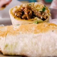 The Beast Burrito · carne asada, pinto beans, rice, avocado, fire roasted salsa, white magic, pico gringo