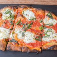 Fresh Mozzarella · Fresh mozzarella, tomato sauce and fresh basil.