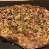 Clam Pizza · Penn Cove clams, chili flakes, pancetta, lemon thyme,  parmesan, olive oil