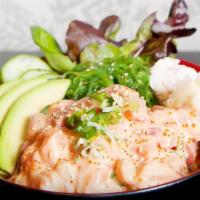 Creamy Pop Poke Bowl · Tuna, salmon, masago, crabmeat, seaweed salad and vegetables over spring mix, house dressing...