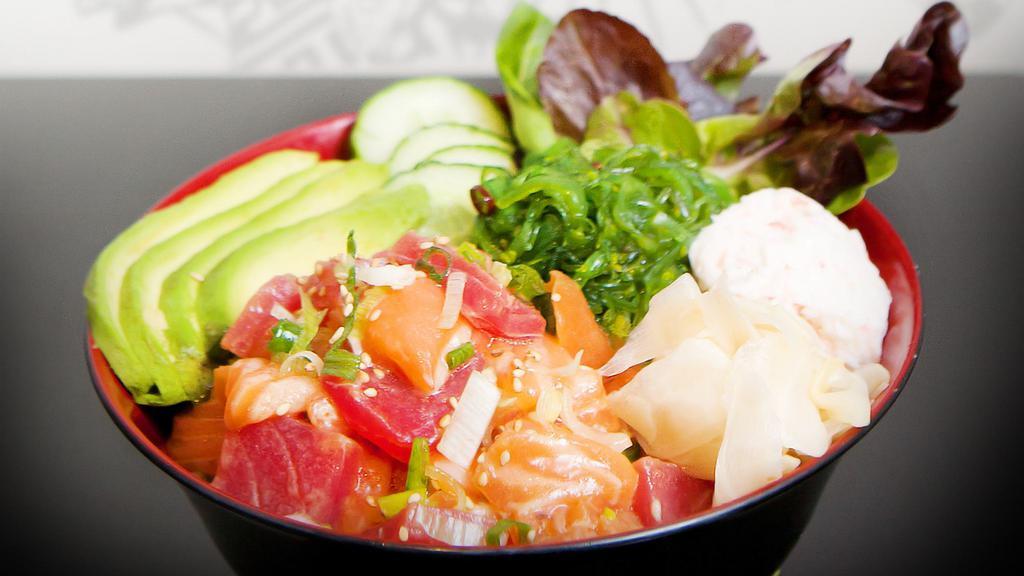 Citrus Poke  · Salmon and Tuna with Citrus Sauce on the rice and Avocado, Imitation Crabmeat, Seaweed Salad, Cucumber and Ginger
