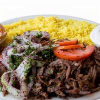 Beef Shawarma Plate · Thinly sliced marinated boneless Beef mixed with our special spices - served with salad and ...