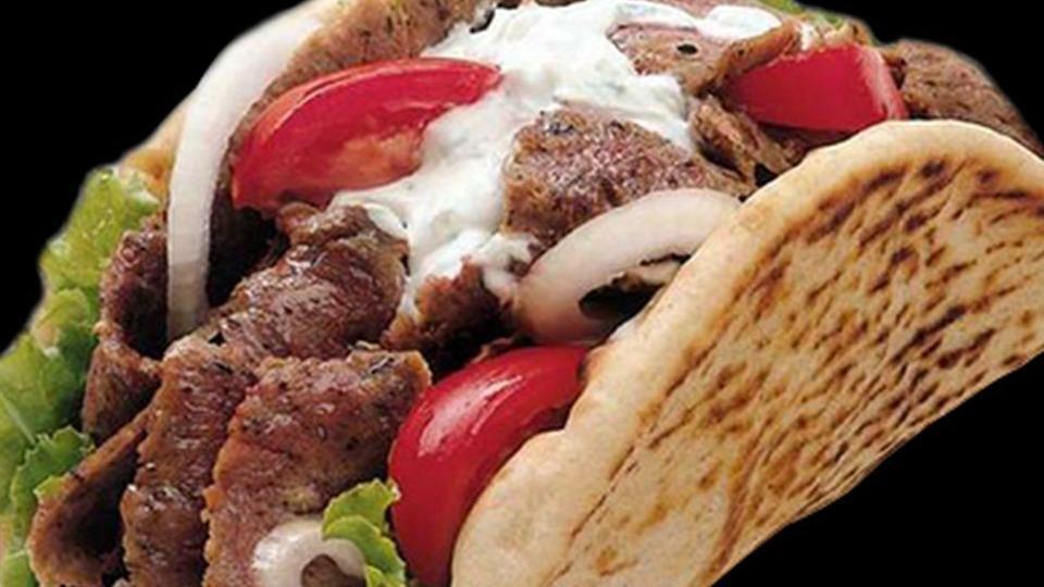 Gyros Sandwich · Thinly cut mixture of lamb and beef mixed with our special spices on a flatbread with lettuce tomato onion and tzatziki sauce.