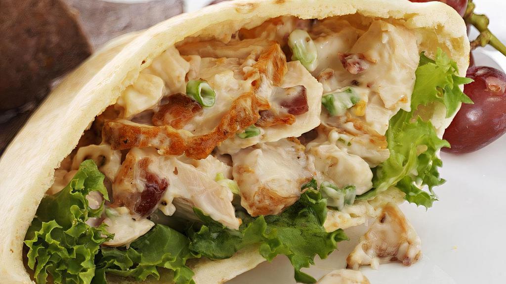 Pitas  · Stuffed Chicken or Beef or Lamb or Falafel in our freshly baked pita bread with lettuce tomato onion and garlic sauce.