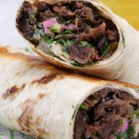 Lamb Shawarma Wrap · Lamb Wrapped with tortilla bread with pickle onion tomato and garlic sauce - served with fri...