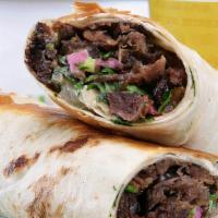 Beef Shawarma Wrap · Beef Wrapped with tortilla bread with pickle onion tomato and garlic sauce - served with fri...