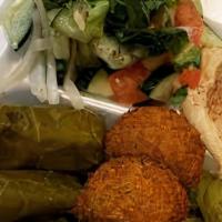 Vegetarian Platter # 1 · Vegan. A combo of hummus, falafel, dolma and Arabic salad served with pita.