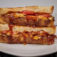 Mac - Mac Daddy · Sweet and spicy bbq mac-n-cheese in a sandwich with an Angus beef patty, tomato, onion and e...