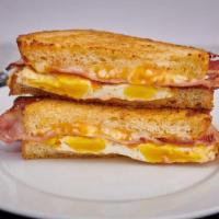 Brk - Og Breakfast Sandwhich · Two eggs, any style, with smoked bacon and sharp cheddar cheese, served with garlic aioli on...