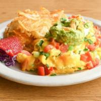 Glo'S Original Scramble · Four large eggs scrambled with tomatoes, green onions, garlic, and cheddar cheese topped wit...